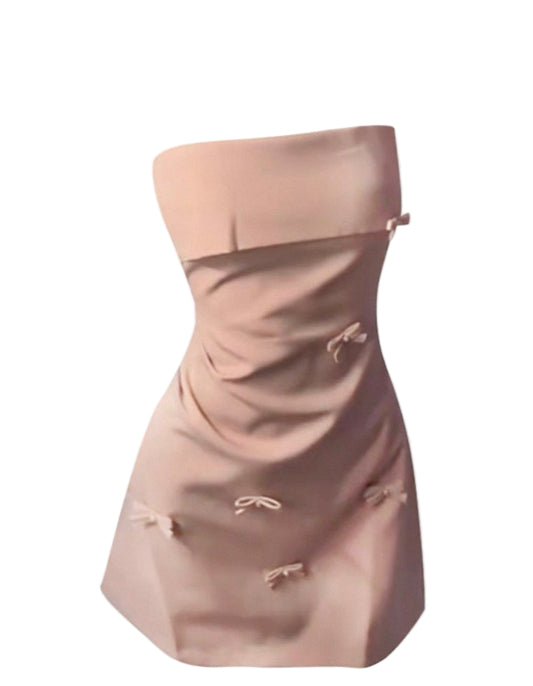 Beige strapless dress with bow details on a white background, featuring the brand 'BGMG'.